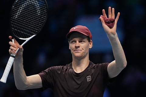 Italy's Jannik Sinner celebrates after winning against Germany's Alexander Zverev during their tennis match of the ATP World Tour Finals.