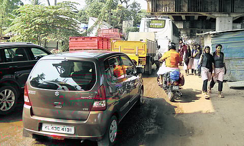 Vehicles caught in traffic gridlock on the Aroor-Thuravoor stretch where construction of elevated highway is progressing