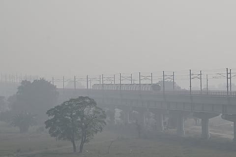 A thick layer of Smog seen over the city, near Yamuna bank on November 12, 2025 in New Delhi.