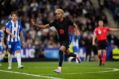 Barcelona's Lamine Yamal reacts after scoring during a Spanish La Liga soccer match between Espanyol and Barcelona in Barcelona, Spain, May 15, 2025.