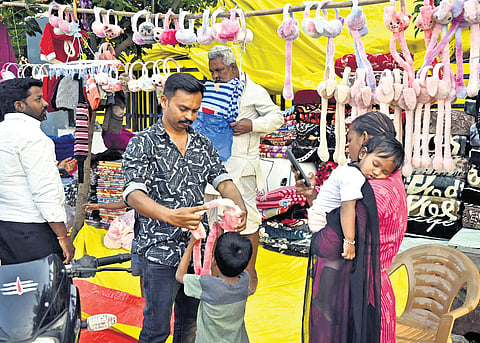 Locals shop for winter wear and blankets to combat cold weather conditions in Karimnagar.