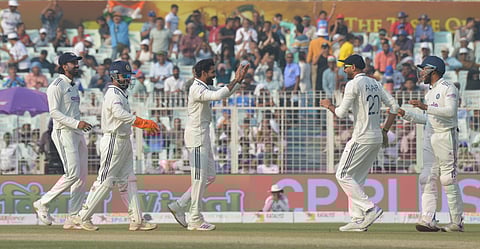 R Jadeja (C), pick of the bowlers for India on Day 2, celebrates a wicket at Eden Gardens on Saturday