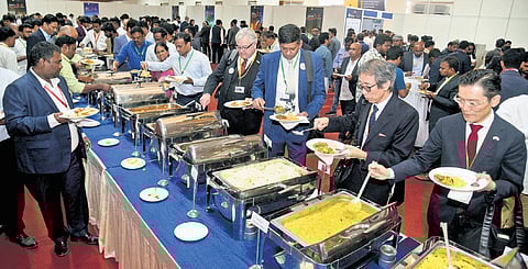 Delegates seen enjoying a wide range of delicacies at the 30th CII Partnership Summit in Visakhapatnam on Friday