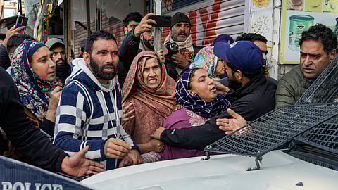 Relatives stage a protest demanding the mortal remains of Mohammad Shafi Parry, a tailor who was killed in an accidental explosion which ripped through Nowgam police station on late Friday night, in Srinagar, Saturday, Nov. 15, 2025. At least nine people were killed and 32 others suffered injuries in the incident, according to officials.