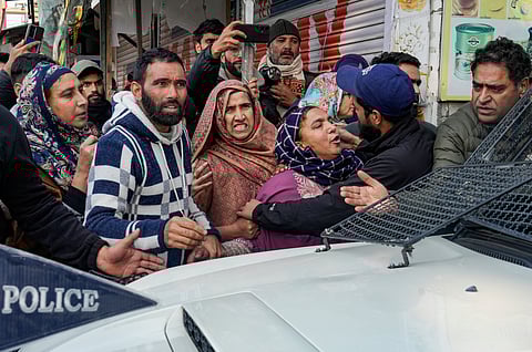 Relatives stage a protest demanding the mortal remains of Mohammad Shafi Parry, a tailor who was killed in an accidental explosion which ripped through Nowgam police station on late Friday night, in Srinagar, Saturday, Nov. 15, 2025. At least nine people were killed and 32 others suffered injuries in the incident, according to officials.