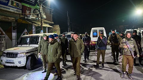 Police officers patrol near the site of an explosion inside a police station in Srinagar, Friday, Nov. 14, 2025.