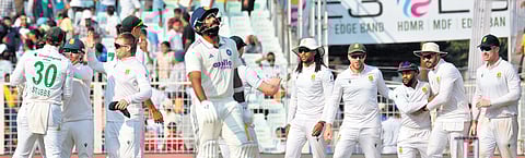 South Africa players celebrate their win over India in the first Test at Kolkata on Sunday.