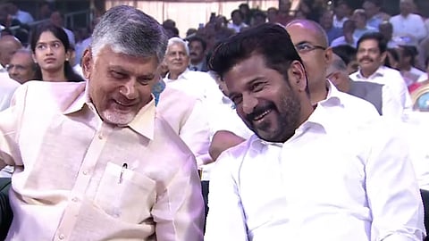 Telangana Chief Minister A Revanth Reddy along with his Andhra Pradesh counterpart N Chandrababu Naidu during the Ramoji Excellence Awards ceremony at Ramoji Film City in Hyderabad.