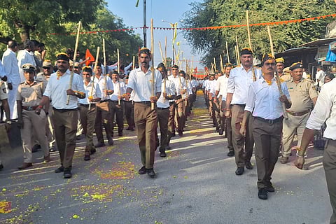 RSS cadres take part in the Pathasanchalana at Chittapur in Kalaburagi district, Karnataka, on Sunday
