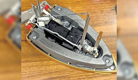 Eleven gold bars worth Rs 1.55 crore were concealed inside the iron box.