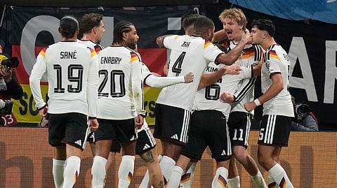 German players celebrate after scoring during a group A World Cup qualifiying soccer match between Germany and Slovakia in Leipzig, Germany, Monday, Nov. 17, 2025.