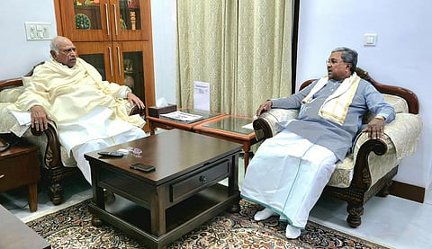 Chief Minister Siddaramaiah meeting with AICC President Mallikarjun Kharage at Delhi on Monday.