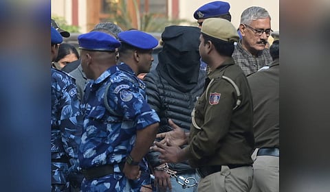 Delhi terror blast accused Jasir Bilal Wani alias Danish, who was arrested by the National Investigation Agency (NIA) being taken from Patiala House Court, Delhi, on Tuesday.