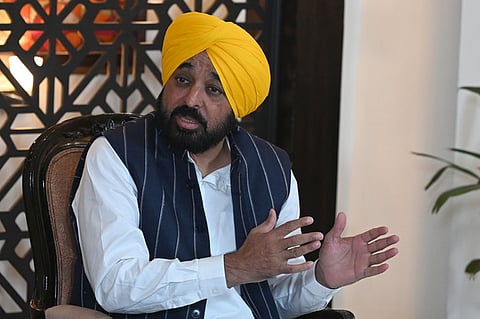 Punjab Chief Minister Bhagwant Mann addresses a press conference, in New Delhi,
