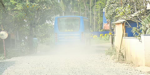 A private bus passing through the dusty Thuravoor-Kumbalangi road.