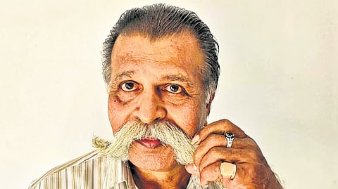A popular figure in his locality of Kalarivathukkal, Giridharan V V stands out instantly in any crowd – with his large, carefully groomed moustache, that has become his signature.