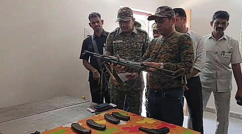 AP Intelligence Chief Mahesh Chandra Laddha along with ASR SP Amit Bardar inspecting seized weapons in Rampachodavaram in ASR district on Tuesday.