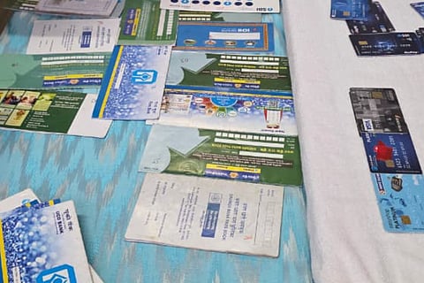 Banks passbooks and ATM cards seized from the accused