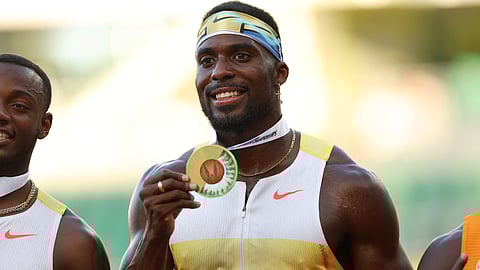 Kenny Bednarek poses after winning the gold medal in the Lake County Men's 100m final during the 2025 USATF Outdoor Championships at Hayward Field on August 01, 2025 in Eugene, Oregon.