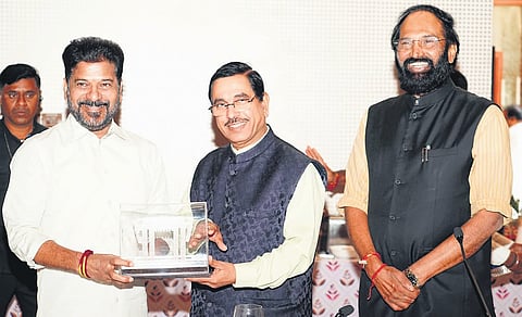 Chief Minister A Revanth Reddy with Union Minister for Consumer Affairs, Food and Public Distribution Pralhad Joshi in Hyderabad on Thursday.