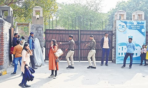 People vacate the premises after a bomb threat was received at Sanskriti School in Chanakyapuri on Thursday