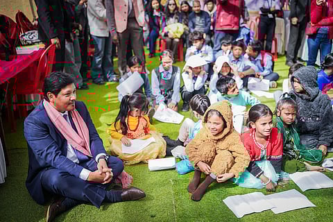 Chief Minister Conrad Sangma with children at the Shillong Literary Festival. (Photo | Express)