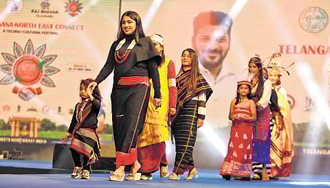 IAS officials from different states take part in a fashion show during Telangana-North East Connect Techno Cultural Festival at HITEX in Hyderabad.