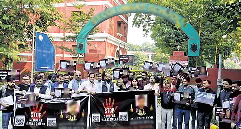 Protests outside the school continued on Friday.