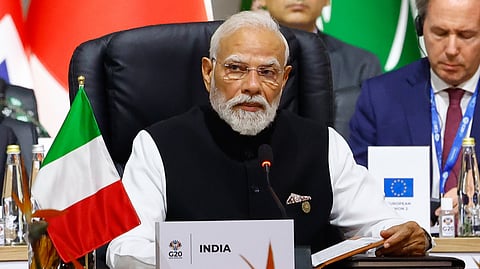 India's Prime Minister Narendra Modi attends a plenary session on the opening day of the G20 Summit, in Johannesburg, South Africa, Saturday, Nov. 22, 2025.