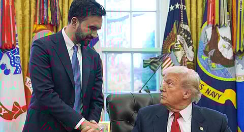 President Donald Trump shakes hands with New York City Mayor-elect Zohran Mamdani in the Oval Office of the White House, Friday, Nov. 21, 2025, in Washington.