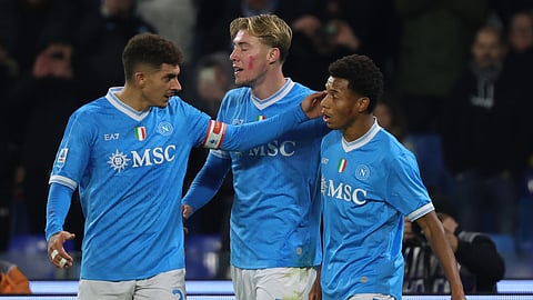Napoli's David Neres, right, celebrates after scoring the opening goal during the Serie A soccer match between SSC Napoli and Atalanta Bergamo in Naples, Italy, Saturday, Nov. 22 , 2025.