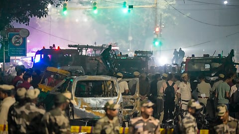 Police personnel at the site of Delhi car blast.