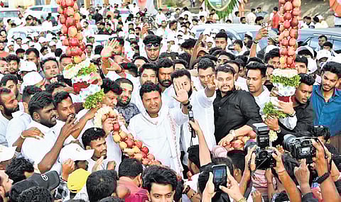 Newly appointed AICC Secretary (in-charge of Gujarat), Srinivas B V got a roaring reception during his maiden visit to Bengaluru after assuming his new role on Sunday.