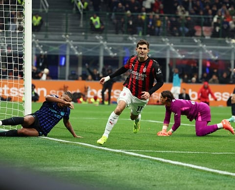 AC Milan's Christian Pulisic celebrates after scoring the only goal in Sunday's 1-0 win over Inter Milan.