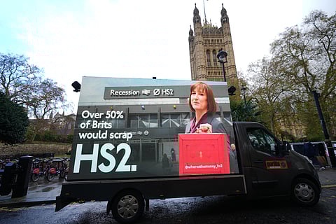 A van displays an electronic screen showing Britain's Chancellor Rachel Reeves ahead of Wednesday's Autumn Budget, in London, Monday, Nov. 24, 2025.