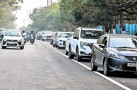 Vehicles as seen parked on the road near Apollo Hospital at Sachivalaya Marg in Bhubaneswar on Tuesday