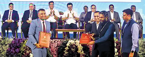 MoUs being exchanged at the TN Rising event in Coimbatore.