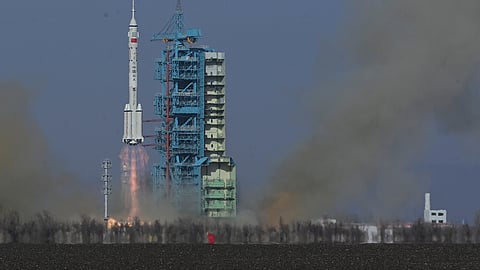 In this photo provided by China's Xinhua News Agency, the Shenzhou-22 spaceship is launched from the Jiuquan Satellite Launch Center in Jiuquan, northwestern China, Tuesday, Nov. 25, 2025.