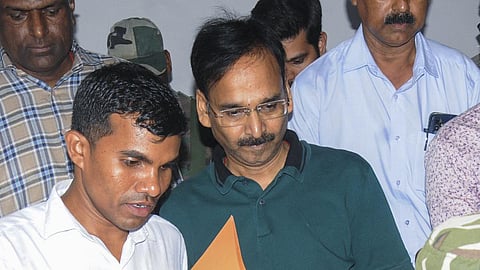 Jharkhand IAS officer Vinay Kumar Choubey after being produced at a special court following his arrest by the Anti-Corruption Bureau in a money laundering case linked to the alleged excise scam in the state, in Ranchi on May 20, 2025.