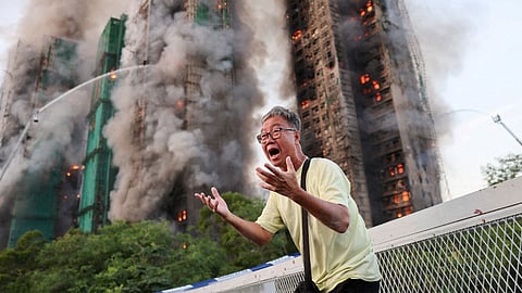 Hong Kong's worst fire in almost 80 years killed at least 65 people in an eight-building apartment complex.