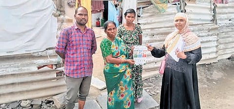 ‘Swachh Mitra’ activists explaining the importance of cleanliness practises to the residents at their door steps in Ongole.