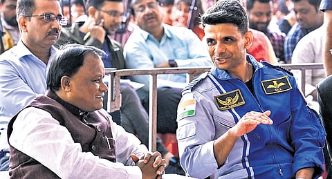 CM Majhi sharing a lighter moment with astronaut Shubhanshu Shukla
