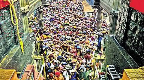 Pilgrims in jam jam-packed queue for darshan of Load Ayyappa in front of the Holy steps in Sabarimala on Wednesday