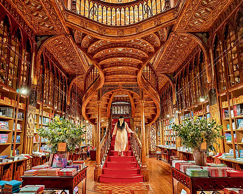 The iconic staircase at Livraria Lello 