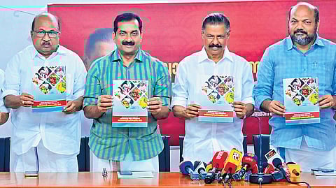 CPM state secretary M V Govindan, minister P Rajeeve, district secretary S Satheesh and K V Thomas during the launch of the LDF election manifesto on Thursday