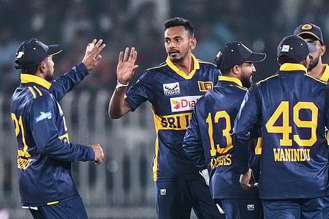Sri Lanka's Dushmantha Chameera, center, celebrates with teammates after the dismissal of Pakistan's Saim Ayub during the second one day international cricket match between Pakistan and Sri Lanka, in Rawalpindi, Pakistan, Friday, Nov. 14, 2025.