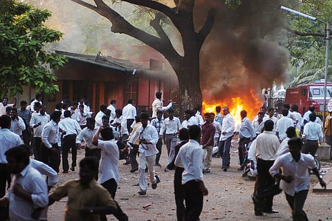 File Photo _ Advocates near the burning police station during a clash with police, inside Madras High Court in Chennai