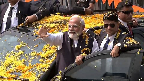 Prime Minister Narendra Modi being welcomed upon his arrival in Udupi, Karnataka.