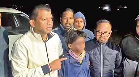 BJD leader and former MP Pradeep Majhi with the injured student.