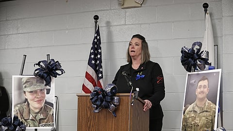 Volunteer Jamie Ackerly speaks during a vigil in honor of National Guard member Specialist Sarah Beckstrom, one of two National Guard members who were shot in Washington on Wednesday, in Webster Springs, W.Va., Friday, Nov. 28, 2025.